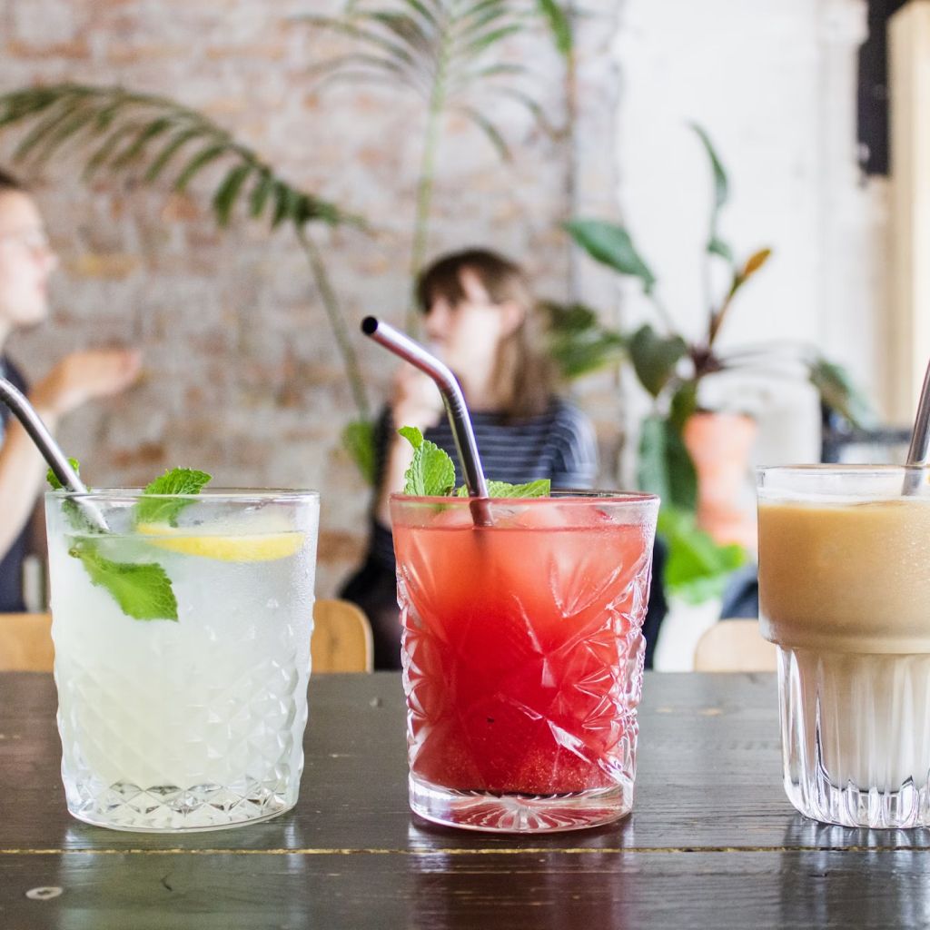Three Assorted Drinks In Glasses