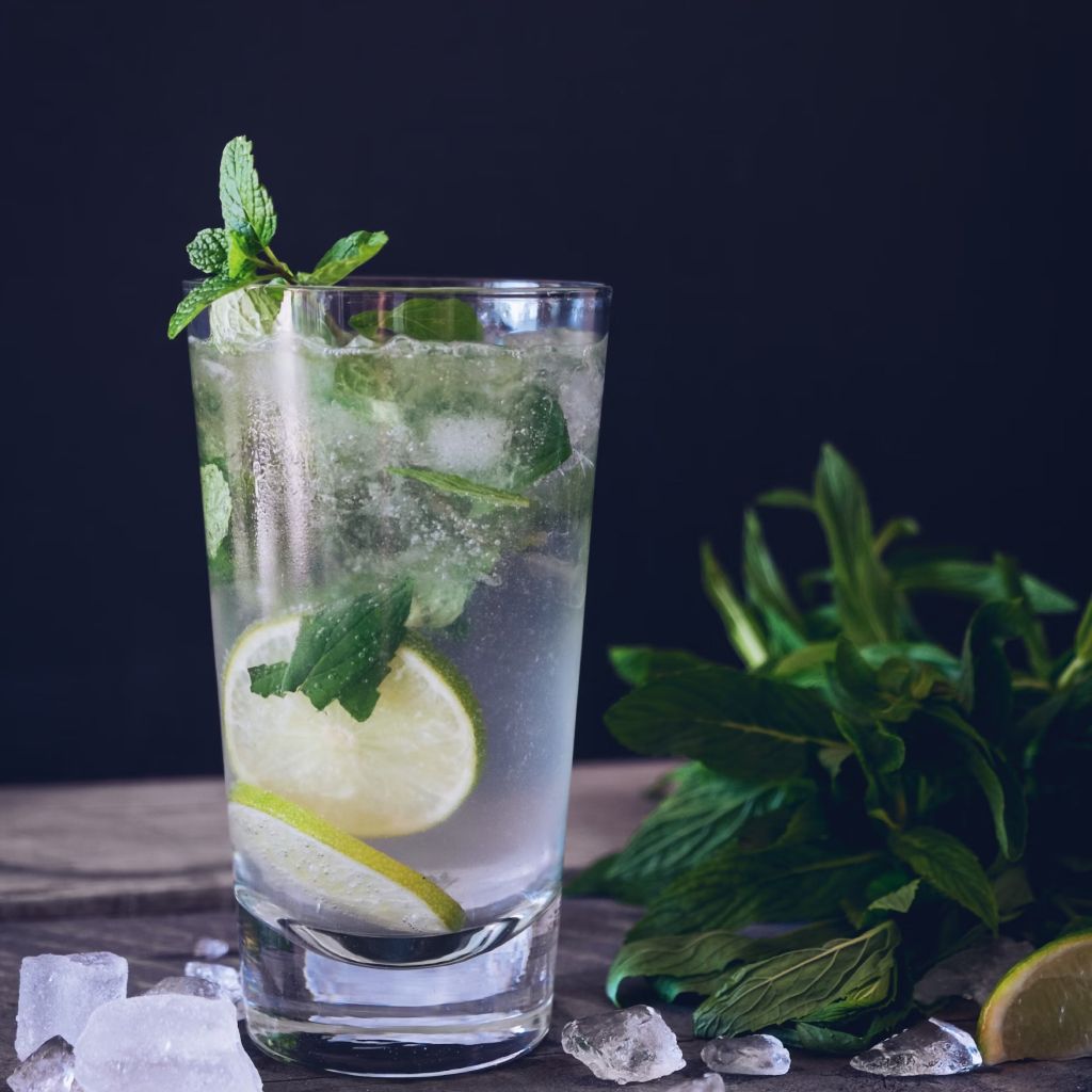 Clear Glass Cup Filled With Water And Lemon